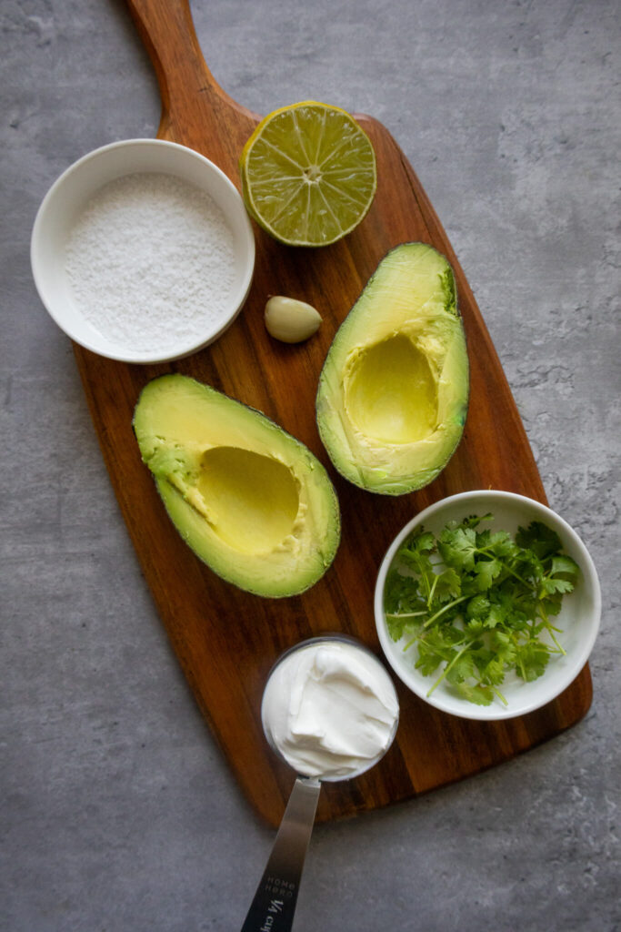 an ingredient spread for making avocado crema